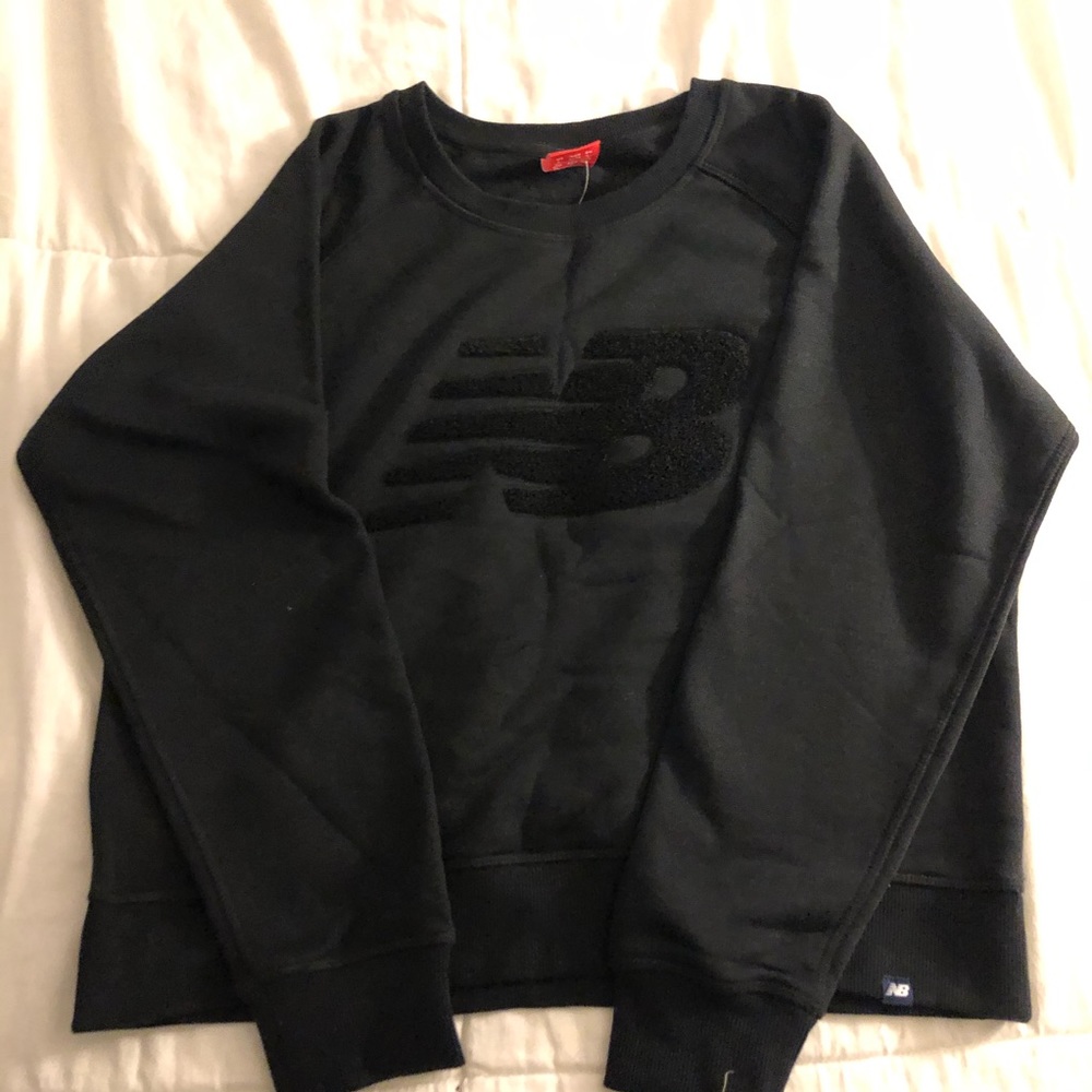 New balance pull over sweater
